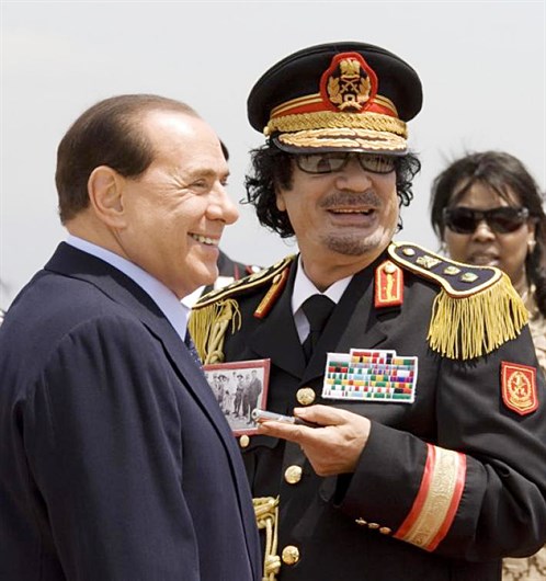 177093 Muammar Gaddafi And Italys Prime Minister Silvio Berlusconi Leave Ciam 1 